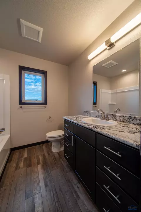 Bath - 627 Bull Run Dr, Box Elder, SD 57719 photo 2 of 6