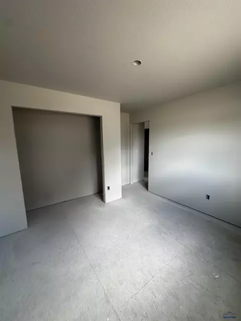 Bedroom - 209 Dorchester Ave, Box Elder, SD 57719 photo 1 of 4