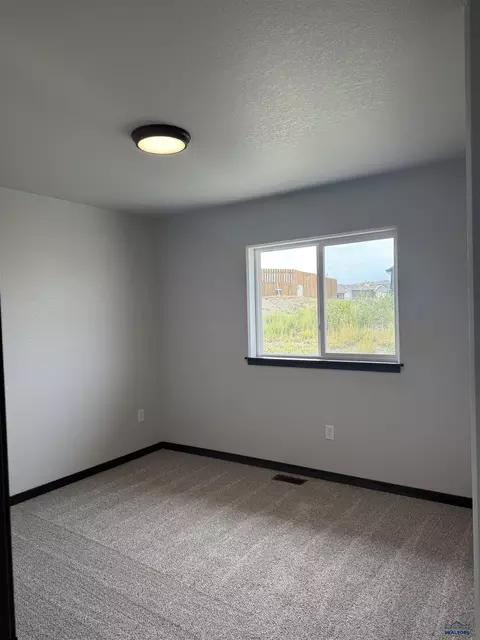 Bedroom - 209 Dorchester Ave, Box Elder, SD 57719 photo 2 of 2
