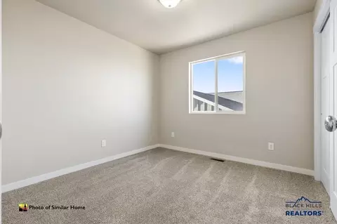 Bedroom - 461 Yelner Dr, Box Elder, SD 57719 photo 2 of 2