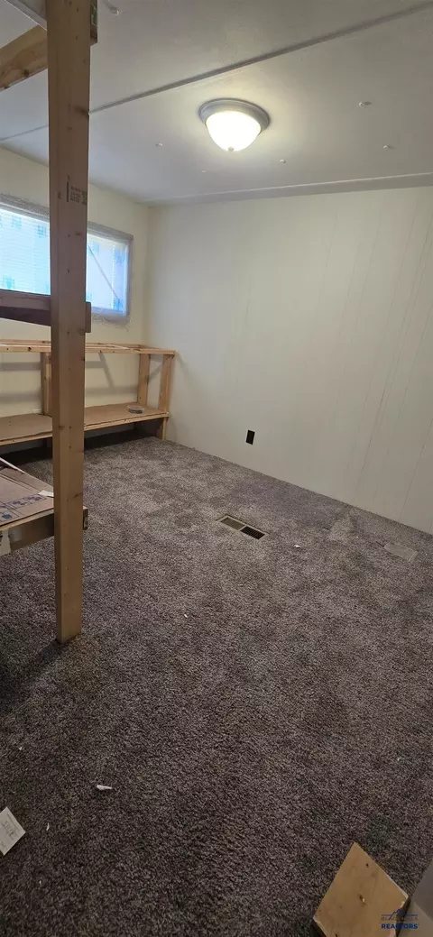 Bedroom - 216 W Box Elder Rd, Box Elder, SD 57719 photo 2 of 3