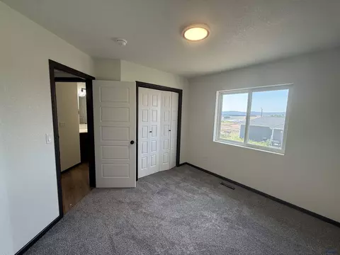 Bedroom - 445 Yelner Dr, Box Elder, SD 57719 photo 2 of 4