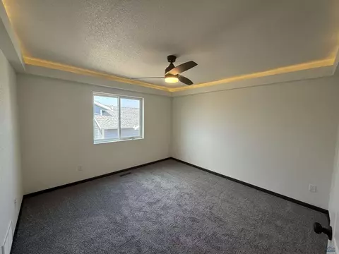 Bedroom - 445 Yelner Dr, Box Elder, SD 57719 photo 1 of 4
