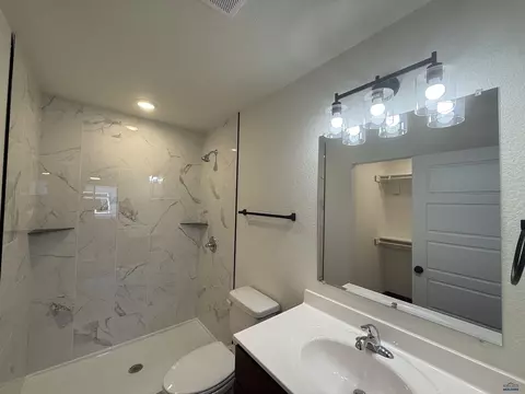 Bath - 445 Yelner Dr, Box Elder, SD 57719 photo 2 of 3