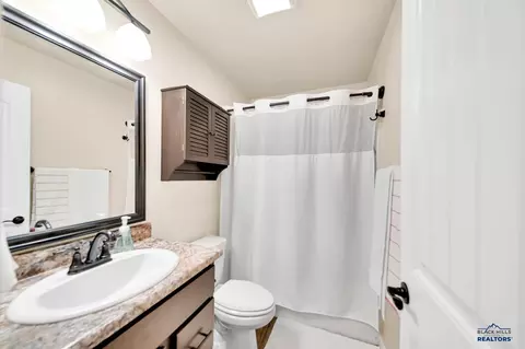 Bath - 648 Liberty Park Dr, Box Elder, SD 57719 photo 1 of 3