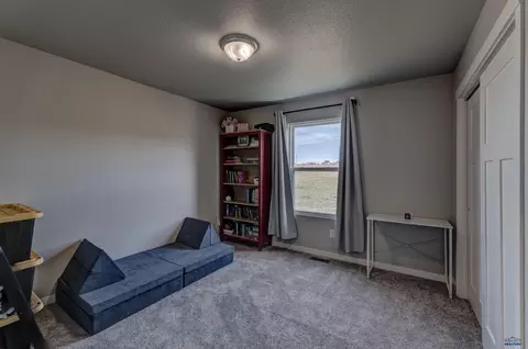 Bedroom - 412 Henry Potter Rd, Box Elder, SD 57719 photo 9 of 10