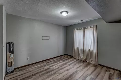 Bedroom - 678 Flight Line Ct, Box Elder, SD 57719 photo 7 of 9