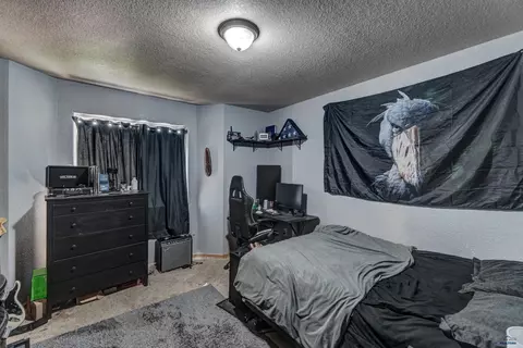 Bedroom - 678 Flight Line Ct, Box Elder, SD 57719 photo 5 of 9