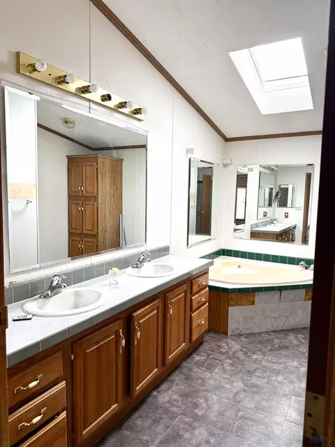 Bath - 14851 Radar Hill Dr, Box Elder, SD 57719 photo 1 of 2