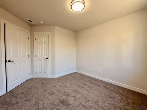 Bedroom - 827 Heritage Dr, Belle Fourche, SD 57717 photo 4 of 5