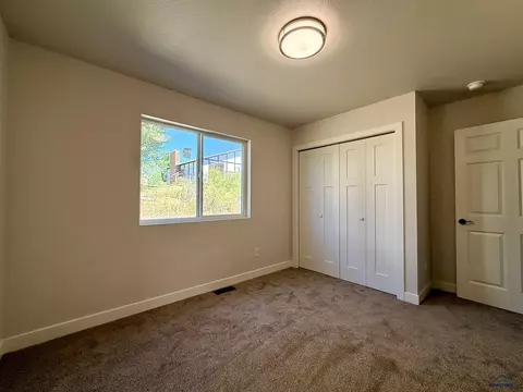 Bedroom - 827 Heritage Dr, Belle Fourche, SD 57717 photo 3 of 5