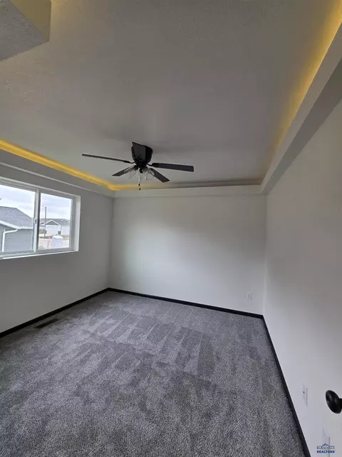 Bedroom - 412 Nighthawk Dr, Box Elder, SD 57719 photo 6 of 11