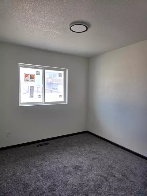 Bedroom - 412 Nighthawk Dr, Box Elder, SD 57719 photo 1 of 11