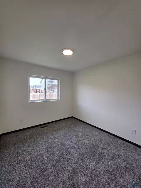 Bedroom - 412 Nighthawk Dr, Box Elder, SD 57719 photo 8 of 11