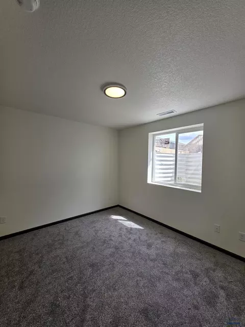 Bedroom - 412 Nighthawk Dr, Box Elder, SD 57719 photo 5 of 11