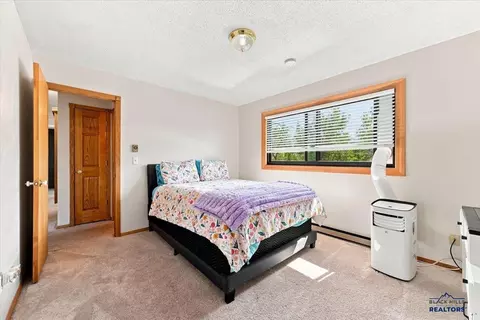 Bedroom - 12301 Ruby Rd, Black Hawk, SD 57718 photo 2 of 6