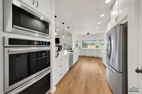 Kitchen - 10825 Quaal Rd, Black Hawk, SD 57718 photo 2 of 2