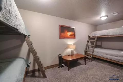 Bedroom - 21140 Last Chance Trl, Lead, SD 57754 photo 1 of 7