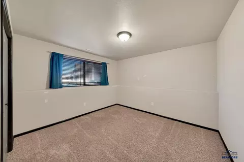 Bedroom - 483 Sovereignty Ln, Box Elder, SD 57719 photo 5 of 8