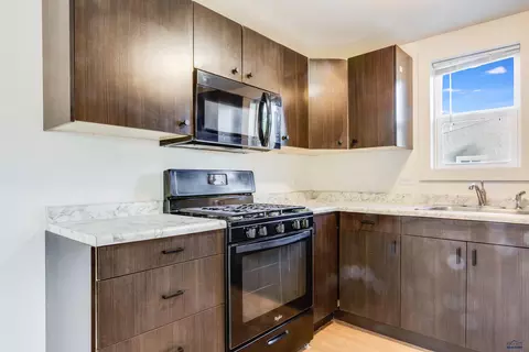Kitchen - 230 E Jackson St, Rapid City, SD 57701 photo 1 of 2