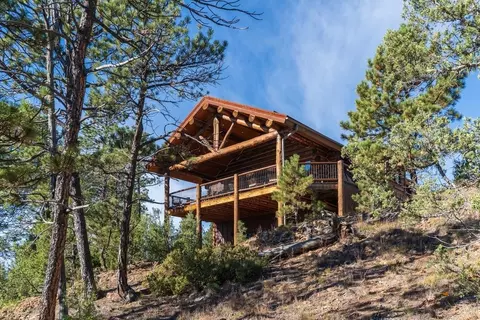 Exterior - 11595 Farmer Rd #WHITE BUFFALO CABIN, Custer, SD 57730 photo 1 of 9