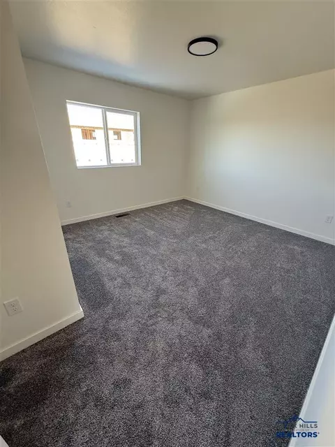 Bedroom - 892 Vicksburg St, Box Elder, SD 57719 photo 1 of 3
