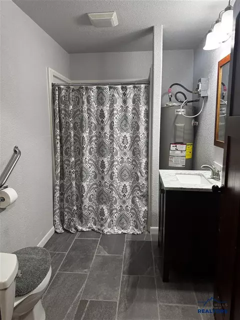Bath - 411 W Summit St, Lead, SD 57754 photo 1 of 3