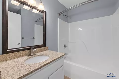 Bath - 328 Ruhe Ln, Box Elder, SD 57719 photo 1 of 3