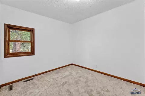 Bedroom - 222 S 2nd St, Custer, SD 57730 photo 2 of 3