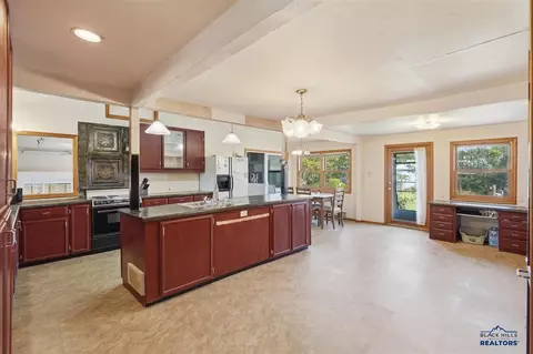 Kitchen - 318 4th Ave, Wall, SD 57790 photo 2 of 3