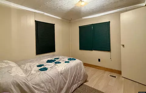 Bedroom - 120 E Highway 70, Baggs, WY 82321 photo 6 of 7