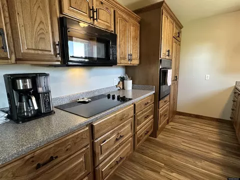 Kitchen - 406 Boyd St, Yoder, WY 82244 photo 2 of 3