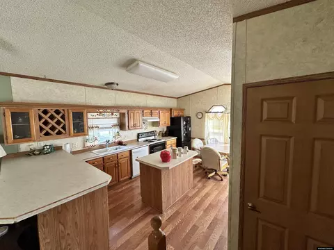 Kitchen - 119 Lacy St, Yoder, WY 82244 photo 4 of 5