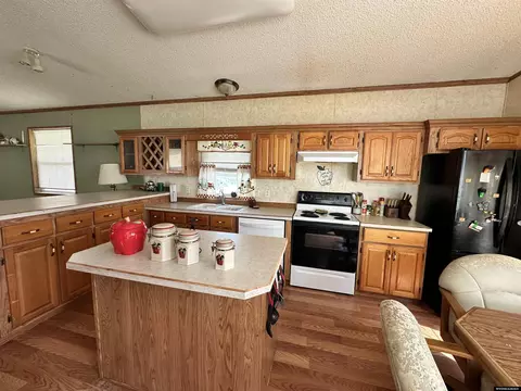Kitchen - 119 Lacy St, Yoder, WY 82244 photo 3 of 5