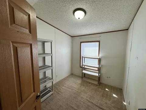 Bedroom - 119 Lacy St, Yoder, WY 82244 photo 2 of 5